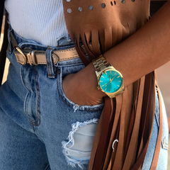 Reloj Woollers Dubali Dorado esfera Turquesa sunray